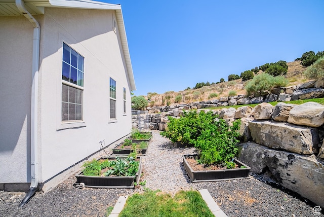 3698 E Butterfield Rd, Eagle Mountain, UT 84005 - view of yard with a garden