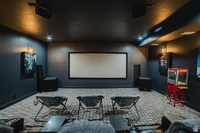 3698 E Butterfield Rd, Eagle Mountain, UT 84005 - home theater room featuring carpet floors and baseboards