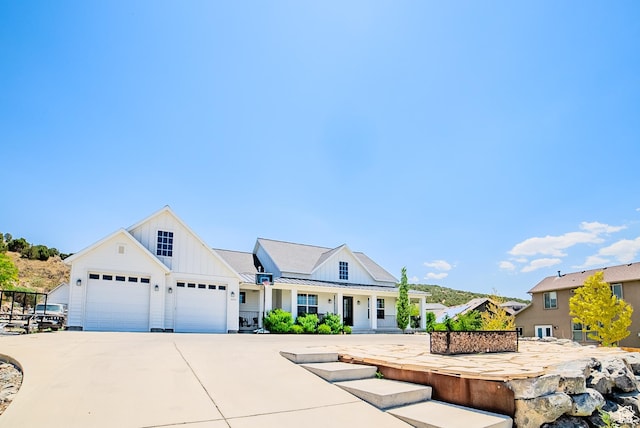 3698 E Butterfield Rd, Eagle Mountain, UT 84005 - modern inspired farmhouse with board and batten siding and concrete driveway