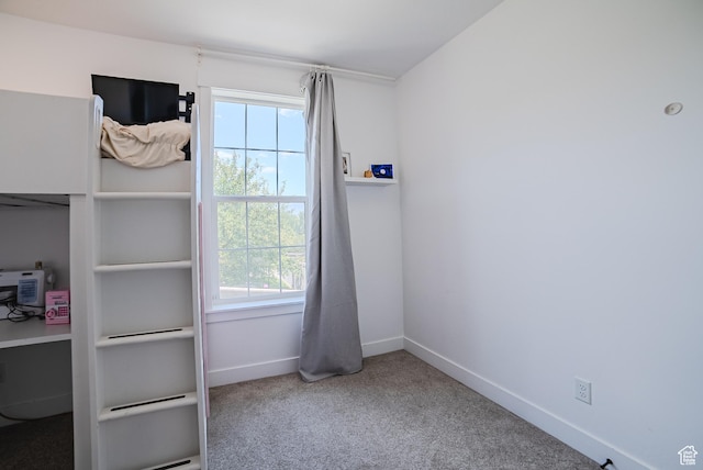 3698 E Butterfield Rd, Eagle Mountain, UT 84005 - unfurnished bedroom featuring multiple windows and carpet flooring
