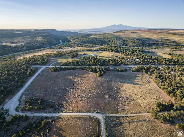 599 S Hideaway Cv S, Monticello, UT 84535 - aerial view of property and surrounding area with a mountain backdrop