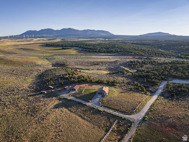 599 S Hideaway Cv S, Monticello, UT 84535 - aerial overview of property's location featuring mountains and rural landscape