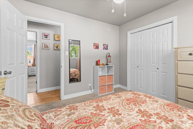 715 S 900 E, Orem, UT 84097 - carpeted bedroom with a closet, ceiling fan, and wood finished floors