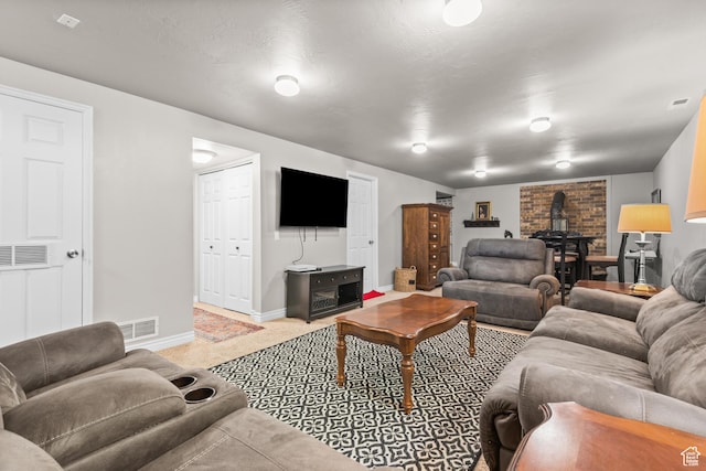 715 S 900 E, Orem, UT 84097 - carpeted living area with a wood stove and baseboards