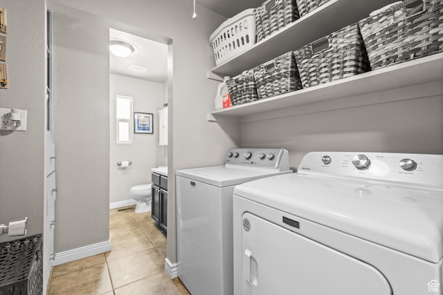 715 S 900 E, Orem, UT 84097 - laundry room with separate washer and dryer and light tile patterned floors