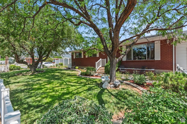 715 S 900 E, Orem, UT 84097 - view of front of house with brick siding and a front yard