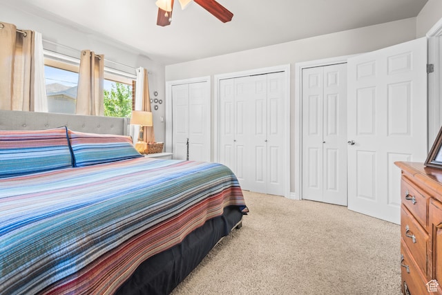 715 S 900 E, Orem, UT 84097 - bedroom featuring two closets, carpet floors, and a ceiling fan