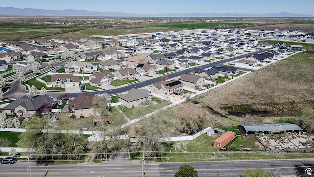 3320 N Plain City Rd W, Plain City, UT 84404 - aerial perspective of suburban area featuring a mountainous background