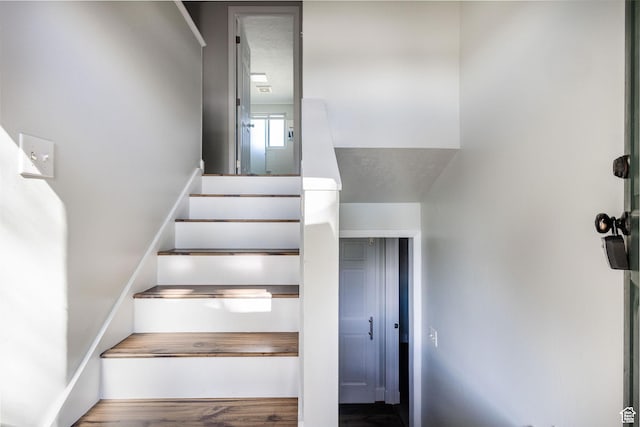 3320 N Plain City Rd W, Plain City, UT 84404 - staircase with wood finished floors