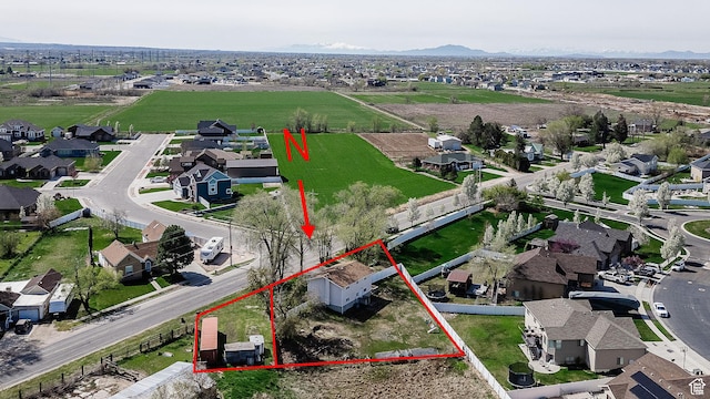 3320 N Plain City Rd W, Plain City, UT 84404 - aerial view of residential area featuring property boundaries highlighted and mountains