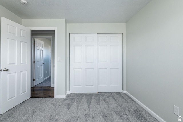 3320 N Plain City Rd W, Plain City, UT 84404 - unfurnished bedroom featuring carpet and a closet