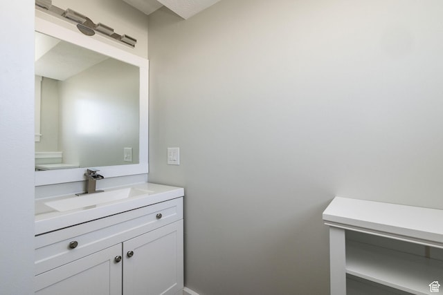 3320 N Plain City Rd W, Plain City, UT 84404 - bathroom with vanity and baseboards