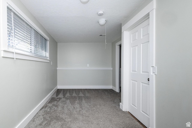 3320 N Plain City Rd W, Plain City, UT 84404 - spare room with carpet, a textured ceiling, and a smoke detector