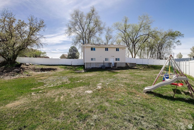 3320 N Plain City Rd W, Plain City, UT 84404 - fenced backyard featuring a playground