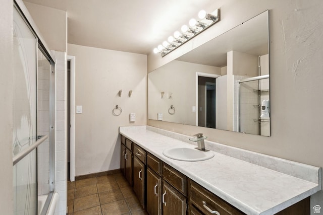 6924 S 2160 W, West Jordan, UT 84084 - bathroom with vanity, tile patterned floors, and bath / shower combo with glass door