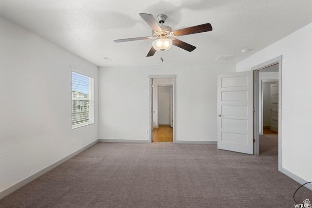 5958 W 8100 S, West Jordan, UT 84081 - unfurnished bedroom with carpet floors, a textured ceiling, and a ceiling fan