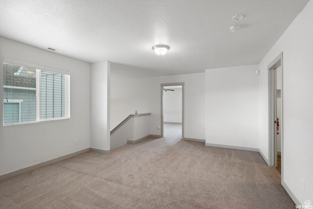 5958 W 8100 S, West Jordan, UT 84081 - unfurnished room with carpet floors, a smoke detector, a textured ceiling, and ceiling fan