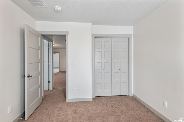 5958 W 8100 S, West Jordan, UT 84081 - unfurnished bedroom with light colored carpet and a closet