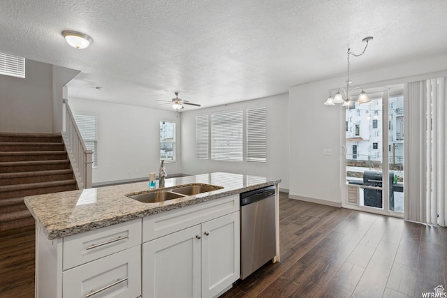 5958 W 8100 S, West Jordan, UT 84081 - kitchen with dishwasher, a textured ceiling, a ceiling fan, dark wood-type flooring, and light stone counters