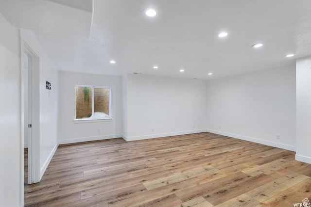 5958 W 8100 S, West Jordan, UT 84081 - empty room with light wood-type flooring and recessed lighting