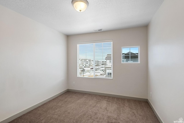 5958 W 8100 S, West Jordan, UT 84081 - unfurnished room featuring light carpet and a textured ceiling