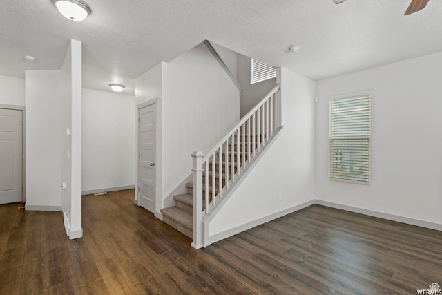 5958 W 8100 S, West Jordan, UT 84081 - stairs featuring wood finished floors, a ceiling fan, and a textured ceiling