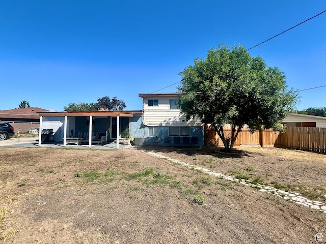3917 S David Pl, West Valley City, UT 84119 - back of house with a sunroom