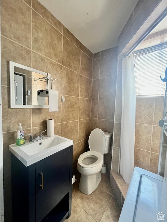 3917 S David Pl, West Valley City, UT 84119 - full bath with tile walls, vanity, tile patterned flooring, and tiled shower