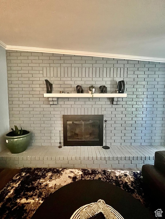 3917 S David Pl, West Valley City, UT 84119 - detailed view of ornamental molding, a brick fireplace, and brick wall