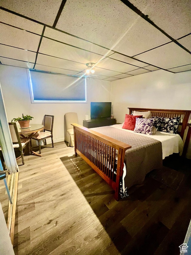 3917 S David Pl, West Valley City, UT 84119 - bedroom with a paneled ceiling and wood finished floors