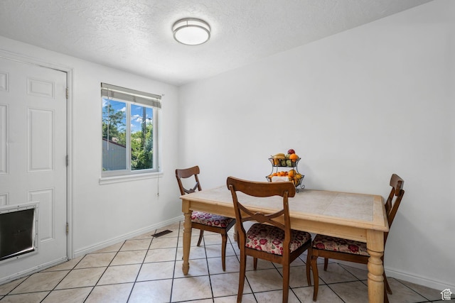 4245 S 3760 W, West Valley City, UT 84120 - dining area with a textured ceiling and light tile patterned floors