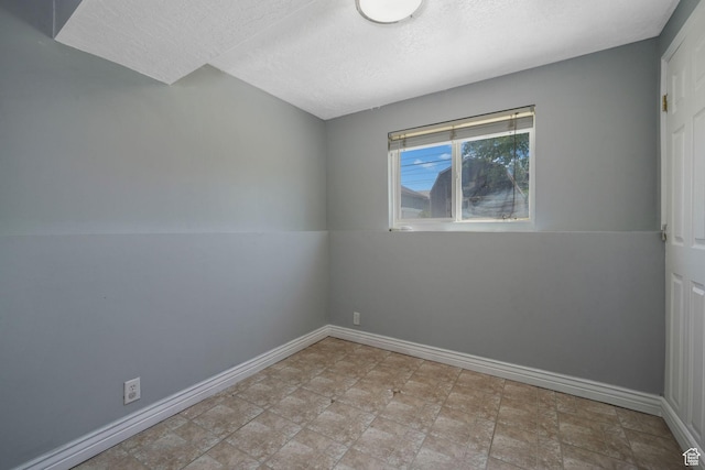 4245 S 3760 W, West Valley City, UT 84120 - empty room with a textured ceiling and stone finish floors