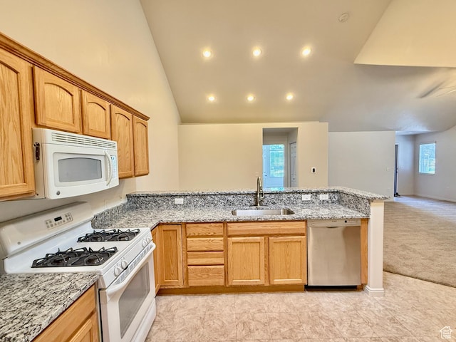 532 W 300 S Unit B, Springville, UT 84663 - kitchen with white appliances, light colored carpet, light stone counters, a peninsula, and recessed lighting
