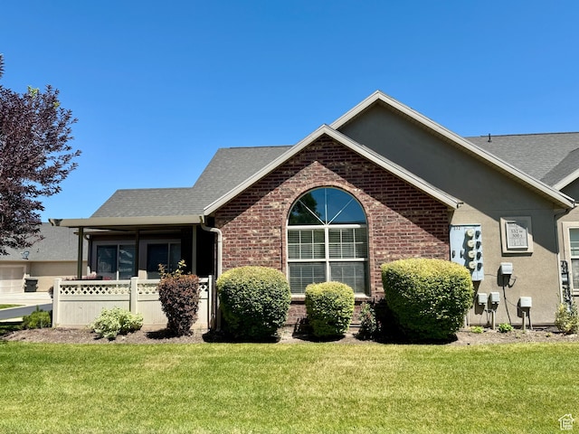 532 W 300 S Unit B, Springville, UT 84663 - view of side of home with brick siding, roof with shingles, and stucco siding