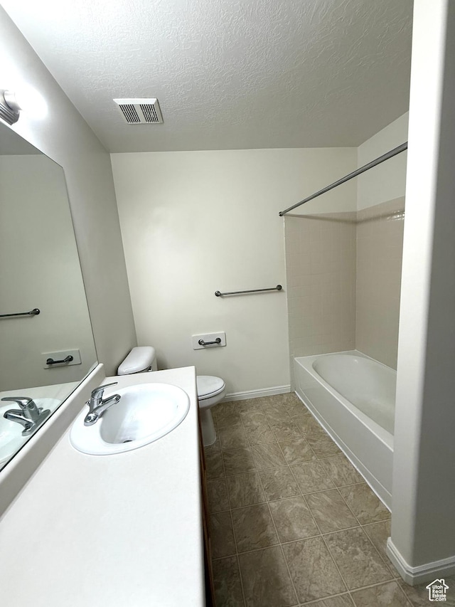 532 W 300 S Unit B, Springville, UT 84663 - bathroom with vanity, a textured ceiling, shower / bath combination, and tile patterned flooring