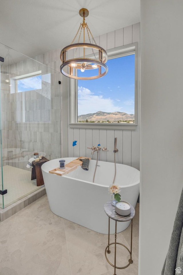 3728 W Chalgrove Rd, Taylor, UT 84401 - full bath with a shower stall, a chandelier, and a soaking tub