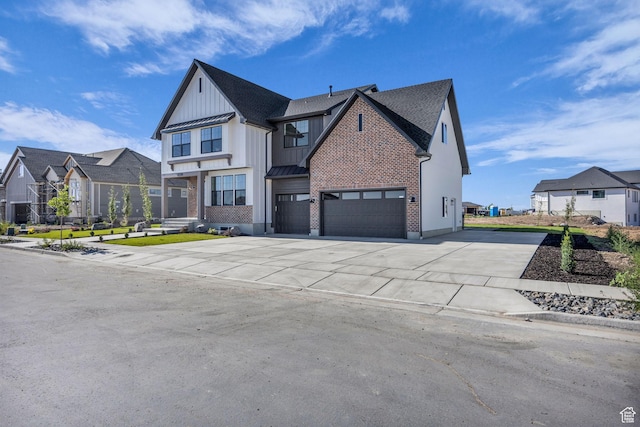 3728 W Chalgrove Rd, Taylor, UT 84401 - modern inspired farmhouse featuring concrete driveway, a standing seam roof, a residential view, board and batten siding, and an attached garage