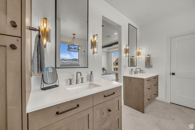 3728 W Chalgrove Rd, Taylor, UT 84401 - bathroom featuring two vanities and tile patterned flooring