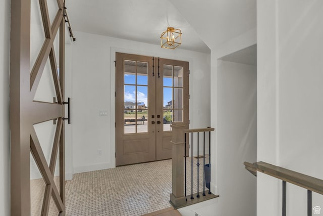 3728 W Chalgrove Rd, Taylor, UT 84401 - entrance foyer featuring french doors, a chandelier, and light tile patterned floors