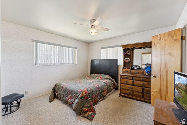 2690 N 4275 W, Plain City, UT 84404 - carpeted bedroom with wallpapered walls and ceiling fan