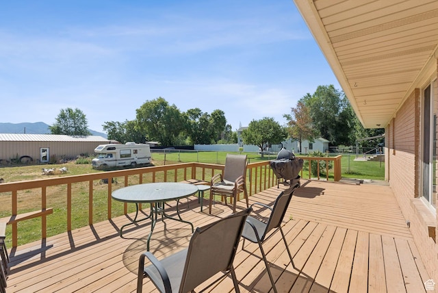 2690 N 4275 W, Plain City, UT 84404 - wooden terrace featuring a yard