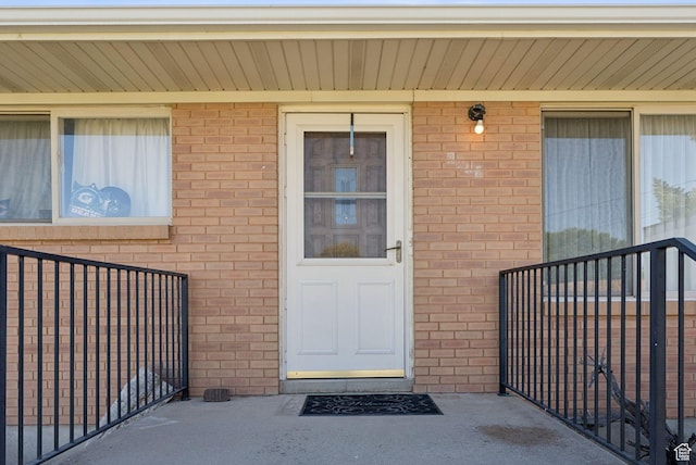 2690 N 4275 W, Plain City, UT 84404 - doorway to property featuring brick siding