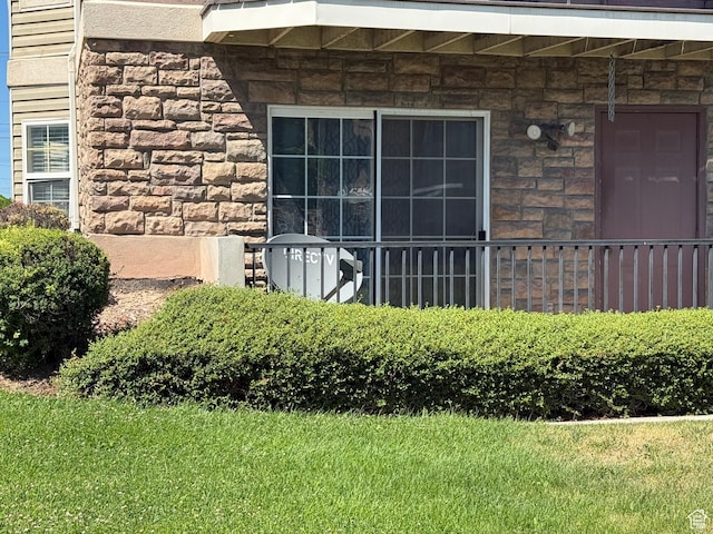 1616 W Vivante Way Unit A3, West Valley City, UT 84119 - view of exterior entry featuring stone siding
