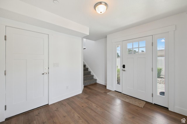 3902 W Pilton Ct, Taylorsville, UT 84129 - entrance foyer featuring hardwood / wood-style floors and stairway