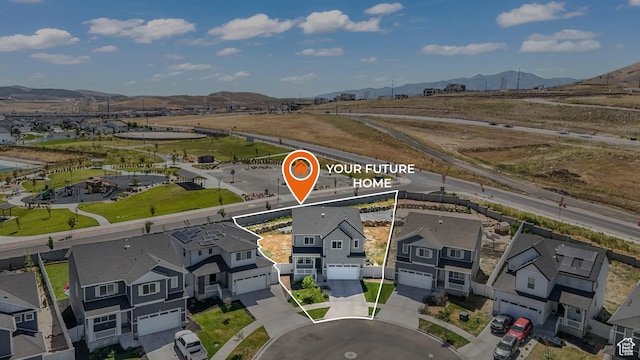 537 W Flora Dr, Saratoga Springs, UT 84045 - aerial perspective of suburban area featuring a mountain backdrop and property boundaries highlighted