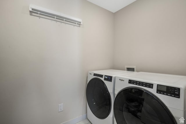537 W Flora Dr, Saratoga Springs, UT 84045 - washroom featuring washing machine and dryer and baseboards