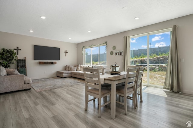 537 W Flora Dr, Saratoga Springs, UT 84045 - dining area featuring light wood-style flooring and recessed lighting