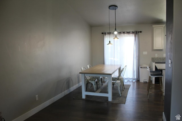 2359 E Prairie Ln, Eagle Mountain, UT 84005 - dining room featuring dark wood finished floors and baseboards