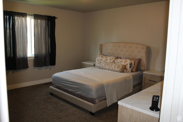 2359 E Prairie Ln, Eagle Mountain, UT 84005 - bedroom featuring dark colored carpet and baseboards