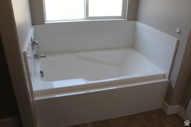 2359 E Prairie Ln, Eagle Mountain, UT 84005 - bathroom with plenty of natural light, a garden tub, and tile patterned floors